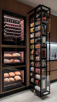 an open refrigerator filled with lots of food in a kitchen next to a counter top oven