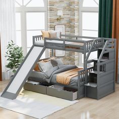 a loft bed with a slide in the middle and storage drawers underneath it, next to a window