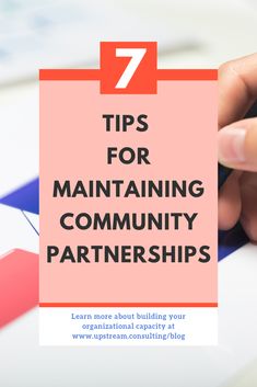 a person's hand writing on a piece of paper with the words 7 tips for maintaining community partners