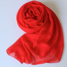 Made from premium mulberry silk chiffon, this scarf is perfect for an autumn/sprint day that is not so chilly. This true red (bright red) coloured silk scarf is bold, outgoing, and energetic choice for any cold day. Available in 4 sizes: 78 by 25 inch (200 by 65 cm) 98 by 25 inch (250 by 65 cm) 78 by 50 inch (200 by 130 cm) 98 by 50 inch (250 by 130 cm) Fabric: 100% Mulberry Silk Chiffon This solid colour series is also available in a lot of other colours. Please check out the Scarf section of my store. Red Silk Scarf For Spring, Classic Red Silk Scarf, Elegant Red Scarves For Spring, Red Scarf As A Spring Gift, Red Scarves As Spring Gifts, Red Scarf For Spring Gift, Red Scarves For Spring Gifts, Classic Red Silk Scarves, Elegant Red Silk Scarf For Summer