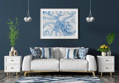 a blue and white living room with an octopus painting on the wall above the couch