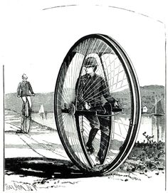 a man riding on top of a bicycle in the shape of a hamster wheel