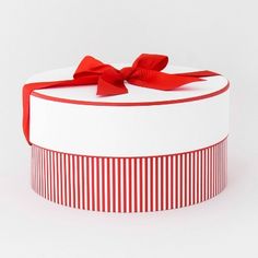 a white box with a red bow on it