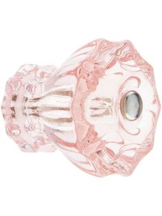 a pink glass door knob on a white background