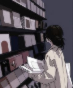 a woman standing in front of a shelf filled with books