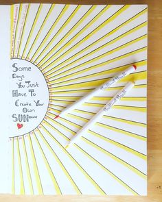 a yellow and white notebook with some writing on it, next to a pen that says some days you just have to move to create your own sun