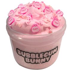 a cup filled with lots of pink frosting