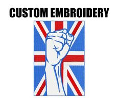 an image of a british flag with the word custom embroidery on it and a fist in the middle