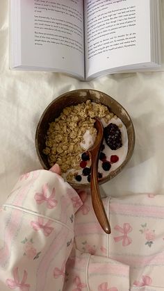 an open book with cereal and yogurt in it