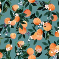 an orange and white flower pattern on a teal background with green leaves and flowers