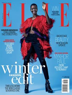 a magazine cover with a woman wearing a red jacket and black pants