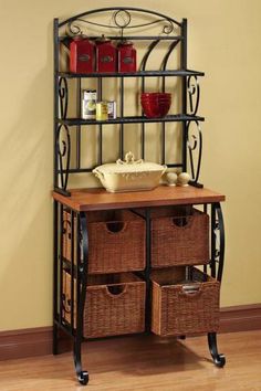 a shelf with baskets on top of it next to a wall