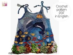 a crochet pattern for a tank top with an image of a dolphin in the ocean