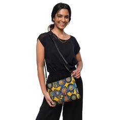 Keep your style on point and your hands free with our versatile crossbody bag. It's made of premium faux leather and features dark gray hardware. Thanks to the zip-top closure and multiple inside pockets, you can keep your essentials secure and organized. Transform this crossbody bag with removable wrist and shoulder straps to style it for day-to-night looks. * Outer fabric: faux leather  * Lining: 100% polyester * 11″ × 8″ × 1.5″ (27.9 cm × 20.3 cm × 3.8 cm) * Dark gray hardware * Zip-top closu Night Out Bag, African Bag, Night Looks, Stylish Bag, Zip Top, Gift For Women, Ankara, Women's Bag, Inside Pocket