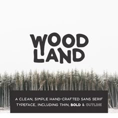 a black and white photo with the words wood land