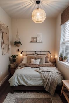 a bedroom with a bed, rugs and lights on the ceiling is shown in this image