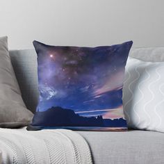 the night sky is filled with stars and clouds, as if it were from outer space throw pillow