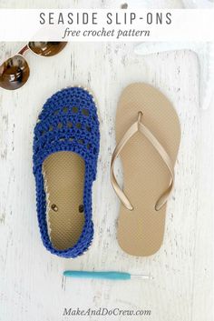 a pair of crocheted slippers sitting on top of a white wooden floor