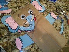 an elephant paper bag sitting on top of a counter