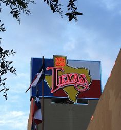 there is a sign that says texas on the side of a building