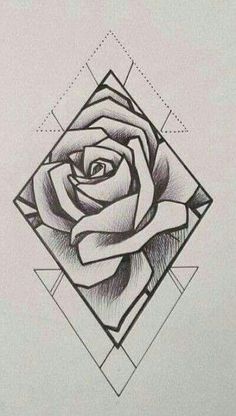 a black and white drawing of a rose on a sheet of paper with geometric shapes