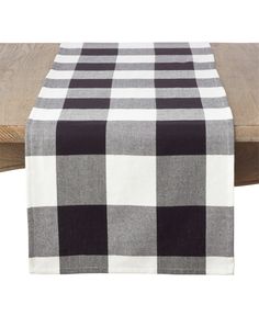 a black and white checkered table runner