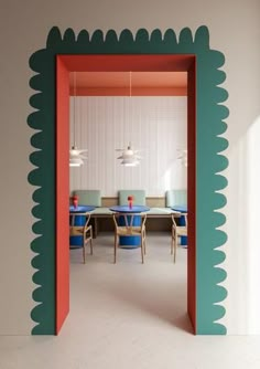 an open room with green and red walls