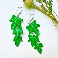 Ivy Leaf Clay  earrings Green Ivy leaves long Dangel earrings Realistic floral jewelry Green leaves accessories botanical miniature jewelry Earrings with Ivy leaves Size with metal base about 7 cm Base stainless steel All my work from polymer clay high quality. They are not afraid of cold, water and dust. All my products you will receive in a gift box! If you have any questions, please contact me. I invite you to my Instagram page @lepkajelry Green Leaf-shaped Botanical Jewelry, Botanical Green Drop Earrings, Green Botanical Drop Earrings, Botanical Leaf-shaped Earrings With Ear Wire, Green Ivy, Ivy Leaf, Floral Jewellery, Ivy, Green Leaves