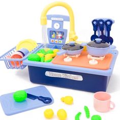 a play kitchen set with toys and accessories