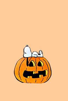 a cartoon pumpkin with two cats sitting on top