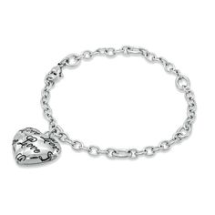 This charming bracelet literally has love written all over it. Fashioned in sleek stainless steel, this puffed heart charm has the word "love" engraved on it over and over in a scrolling script font. Designed to delight, this heart is polished to a brilliant shine and suspends along a 7.5-inch rolo chain bracelet that secures with a lobster claw clasp. Station Bracelet, Word Love, Puffed Heart, Rolo Chain, Silver Chain Necklace, Heart Charm Bracelet, Bracelet Designs, Stainless Steel Bracelet, Heart Charm