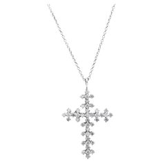 0.65Ct Natural Diamond Cross Necklace in 14K Solid White Gold Amazing looking piece! Stamped: 14k Total Natural Diamond Weight is: Approx. 0.65 Carats ( G-H / SI) Pendant Measures: 30.80 x 19.50mm Chain Length is: 18 inches Total item weight is: 3.1 grams Disclaimer: all weights, measurements and colors are approximate and may vary slightly from the listed dimensions or as seen in the image. All pictures are magnified to show the smallest of details. Please, refer to the item description for act Diamond Cross Necklace, Diamond Cross Necklaces, Diamond Cross Pendants, Diamond Cross, Cross Jewelry, Cross Pendant Necklace, White Gold Diamonds, Chain Lengths, Cross Pendant