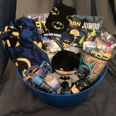 the batman gift basket is packed and ready for someone to put in their car seat