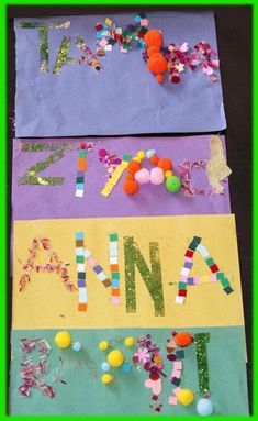 the letters are made out of construction paper and plastic beads on top of each other