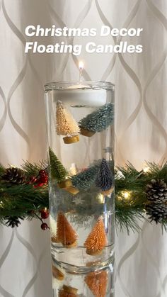 christmas decor floating candles in a glass vase