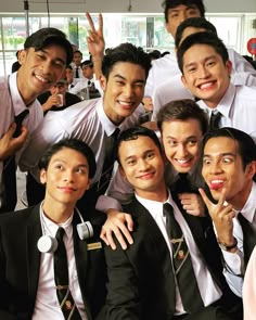 a group of young men posing for a photo