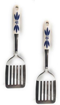 Temp-tations Old World 2-piece Stainless Steel Utensil w/silicone handle K28265 Service with a smile. This two-piece utensil set boasts a modern design and the Old World pattern, along with durable stainless steel heads and silicone handles with lovely handpainted flowers and bold accents. From Temp-tations(R) Ovenware. Includes TWO slotted spatulas Each measures approximately 12"L Stainless steel head and silicone handle We may ship USPS or another carrier. Our business days are Tuesday thru Saturday. We do appreciate your business. Stainless Steel Utensils, Spatula Set, Spatulas, Serving Utensils, Utensil Set, Old World, 2 Piece, The Old, Modern Design