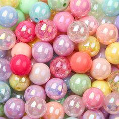 many different colored beads are shown together