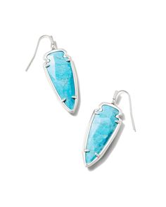 An all-time Kendra Scott favorite is back. The Skylar Vintage Silver Drop Earrings in Variegated Dark Teal Magnesite feature our beloved Skylar arrowhead shape, captured in a face-framing drop earring that’s sure to turn heads with its clean lines and stunning stone. These earrings are part of Yellow Rose by Kendra Scott—a brand that celebrates ranch life with Kendra Scott staples alongside select curated jewelry pieces and accessories. Metal Vintage Silver Over Brass Material Variegated Dark Te Arrowheads Jewelry, Rodeo Jewelry, Small Drop Earrings, Southwest Jewelry, American Southwest, Statement Ring Silver, Long Pendant, Face Framing, Drop Earring