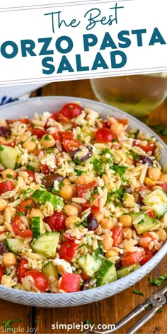 the best orzo pasta salad in a white bowl