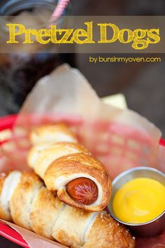 hot dog wrapped in bread with mustard and ketchup