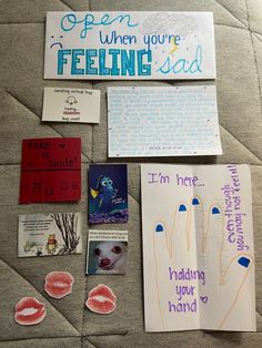 several pieces of paper with words and pictures on them, including handwritten letters that spell out feelings