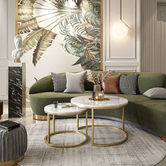 an elegant living room with green couches and gold coffee table in front of a wall mural