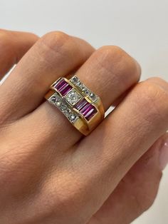 Vintage Ruby Tank Ring, 0.30CT Old Mine Diamond, 14k Yellow Gold Ring, Antique Jewelry, Gold Tank ring, ruby baguette ring, Estate Jewelry ~~ S e t t i n g ~~ Solid 14k Yellow Gold 8.00 grams Ring Size 7.5,7.25,7,7.75,8;7.5 US   ~~ Stones ~~ Main Stone: Old Mine Shape Natural Diamond In Weight Of 0.30 Ct (Approx.)  Clarity - Si2 Color  - F Side Stones: Baguette Shape Natural Ruby In Weight Of 1.20 Ct (Approx.) Color  - Pink So who is Nola? Nola is our creation and imagination. All the idea of No Vintage Yellow Gold Rings With Baguette Diamonds, Gold Ruby Ring With Baguette Diamonds For Anniversary, Ruby Jewelry With Baguette Diamonds For Anniversary, Anniversary Ruby Jewelry With Baguette Diamonds, Anniversary Jewelry With Baguette Diamonds And Ruby, Anniversary Yellow Gold Ruby Ring With Baguette Diamonds, Red Baguette Diamond Rings For Anniversaries, Red Baguette Diamond Rings For Anniversary, Ruby Rings With Baguette Diamonds For Anniversary