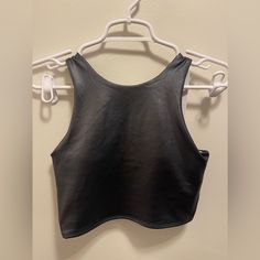 Nwt Shiny Black Crop Top Fits A-C Cup. Chest: 14” Length: 15.5” Sporty Stretch Crop Top For Night Out, Black Stretch Tank Top For Club, Stretch Black Tank Top For Club, Black Fitted Tank Top For Club, Fitted Racerback Top For Club, Fitted Black Tank Top For Club, Trendy Black Crop Top For Workout, Fitted Black Workout Tank Top, Basic Black Sports Top