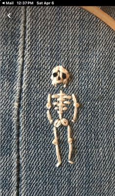 a piece of cloth with a skeleton on it