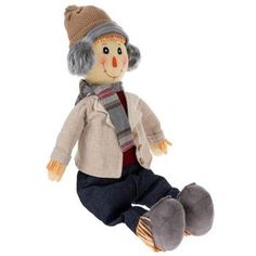 a stuffed animal with a hat and scarf on it's head, sitting in the air