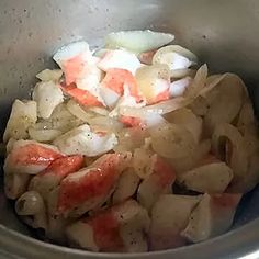 the food is being cooked in the pot