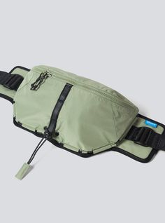 Technical running sling bag with 2L volume, multiple secure pockets, and weather repellent fabric; adaptable fit + 2-way wearability. Read more Sizing How To Wear It One size fits most Behind the design The Multipass Sling Bag pulls double-duty: as a lightweight yet secure place to stash a shell, nutrition, sunnies + water when out running and as a casual day-pack for a passport, wallet, phone + more when out exploring. Technical enough to perform while stylish enough for daily wear, the Multipa Hands Free Bag, Running Bag, Running Pack, Tech Bag, Fanny Bag, Crossbody Bags For Travel, Adjustable Bag, Passport Wallet, Men Fits