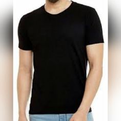 Zara Men's Black Shirt, Size Medium Step Into Timeless Sophistication With The Zara Black Shirt. Crafted With Meticulous Attention To Detail, This Shirt Exudes Understated Elegance And Versatility. Please Refer To The Item On The Mannequin. While It May Resemble The Item Worn By The Model The Image Is A Stock Photo And May Depict A Similar Item. While This Item Is New And In Good Condition.We Recommend Giving Them A Thorough Cleaning Before Wearing. All Items Are Returned To Storage Once Listed Classic Black Plain Shirt, Classic Plain Black Shirt, Casual Black Plain Shirt, Basic Black Plain Shirt, Zara Classic Black Tops, Classic Black Zara Top, Maroon Dress Shirt, Zara Denim Jeans, Zara Black Short Sleeve T-shirt